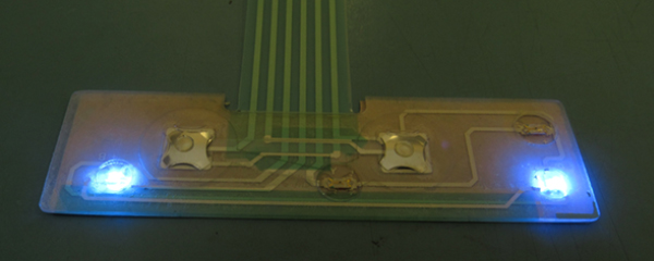 Blue LEDs illuminating with a PET Circuit