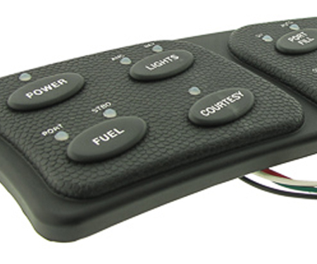 Molded rubber boot with general backlighting and status LEDs