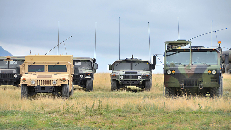 Military Convoy Showing Vehicle Antennas Military Convoy Showing Vehicle Antennas