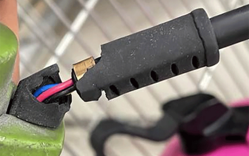 Overmold damaged by bending event with exposed inner wire jackets