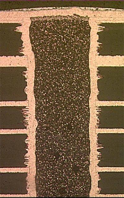 PCB cross section with conductive fill via PCB cross section with conductive fill via