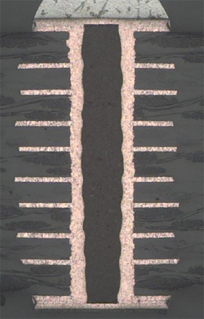 PCB cross section with copper-plated shut filled via PCB cross section with copper-plated shut filled via