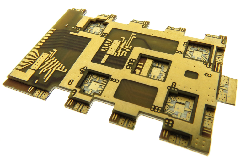 Complex RF hybrid circuit board designed with cavities Complex RF hybrid circuit board designed with cavities