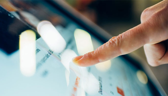 Touch screen pressed with a finger